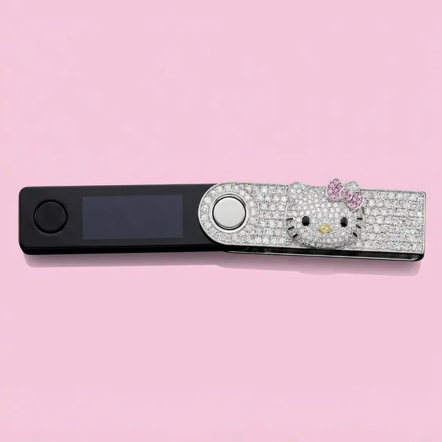 Kitty Case, iced Ledger cover set with white, pink and yellow diamonds